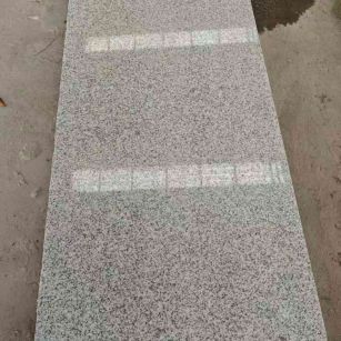 安徽芝麻白光面毛板